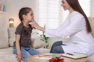 Registered Behavior Technician working with child during ABA therapy session