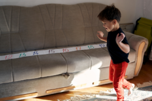 Child with autism demonstrating hand flapping behavior